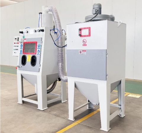Tumble basket sandblasting machine with dual loading ports and digital controls - efficient mass finishing for small metal components.