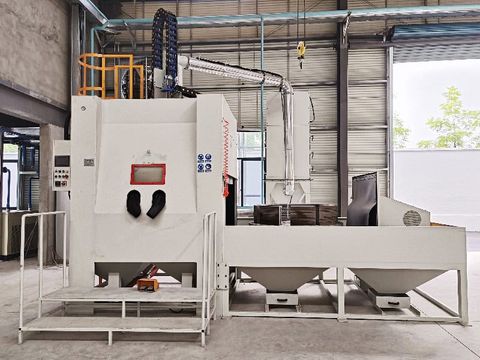 White industrial ​​Mold Blasting Machine​​ with digital display, black control panel, yellow safety rails, and bottom collection system in factory setting.