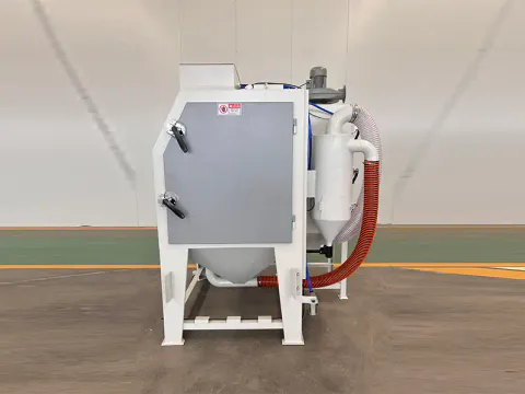 Side view of TS9060 suction blasting cabinet with dust collection system for industrial abrasive blasting applications.