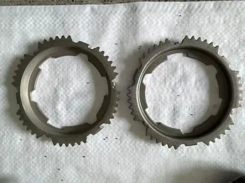 Steel gear synchronizer ring before and after descaling sandblasting in suction blasting cabinet